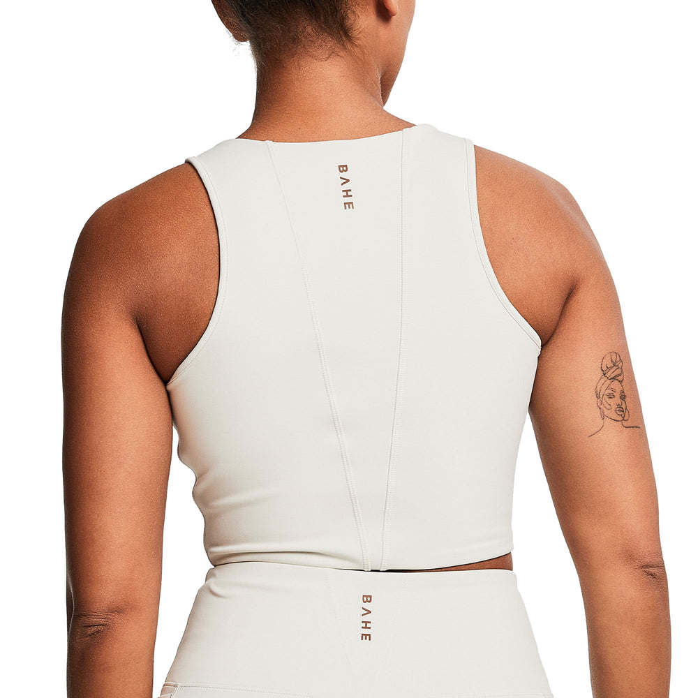 
                      
                        REFORMA HIGH NECK LONGLINE CROP COCONUT
                      
                    